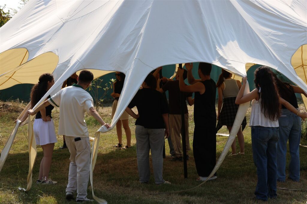 Frontline participants working together during a team activity
