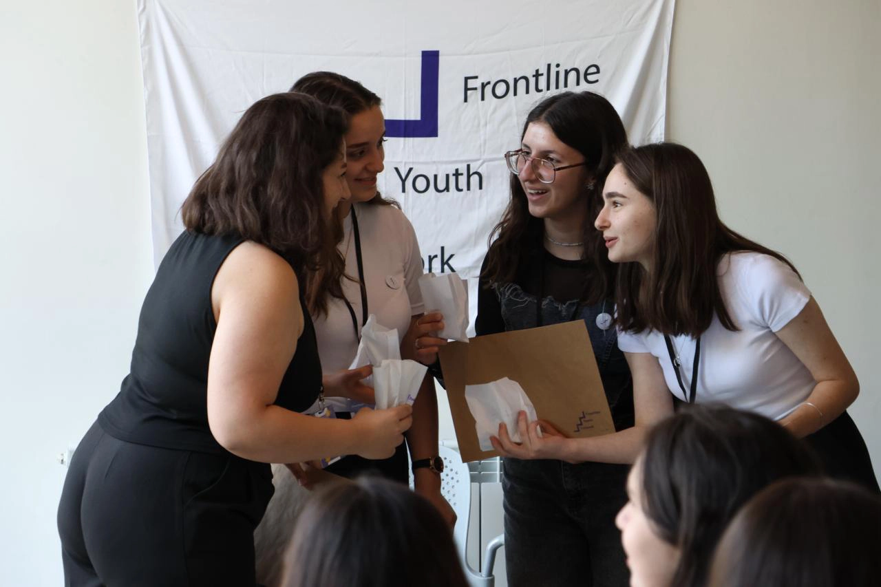 Young Frontline participants collaborating during a team activity